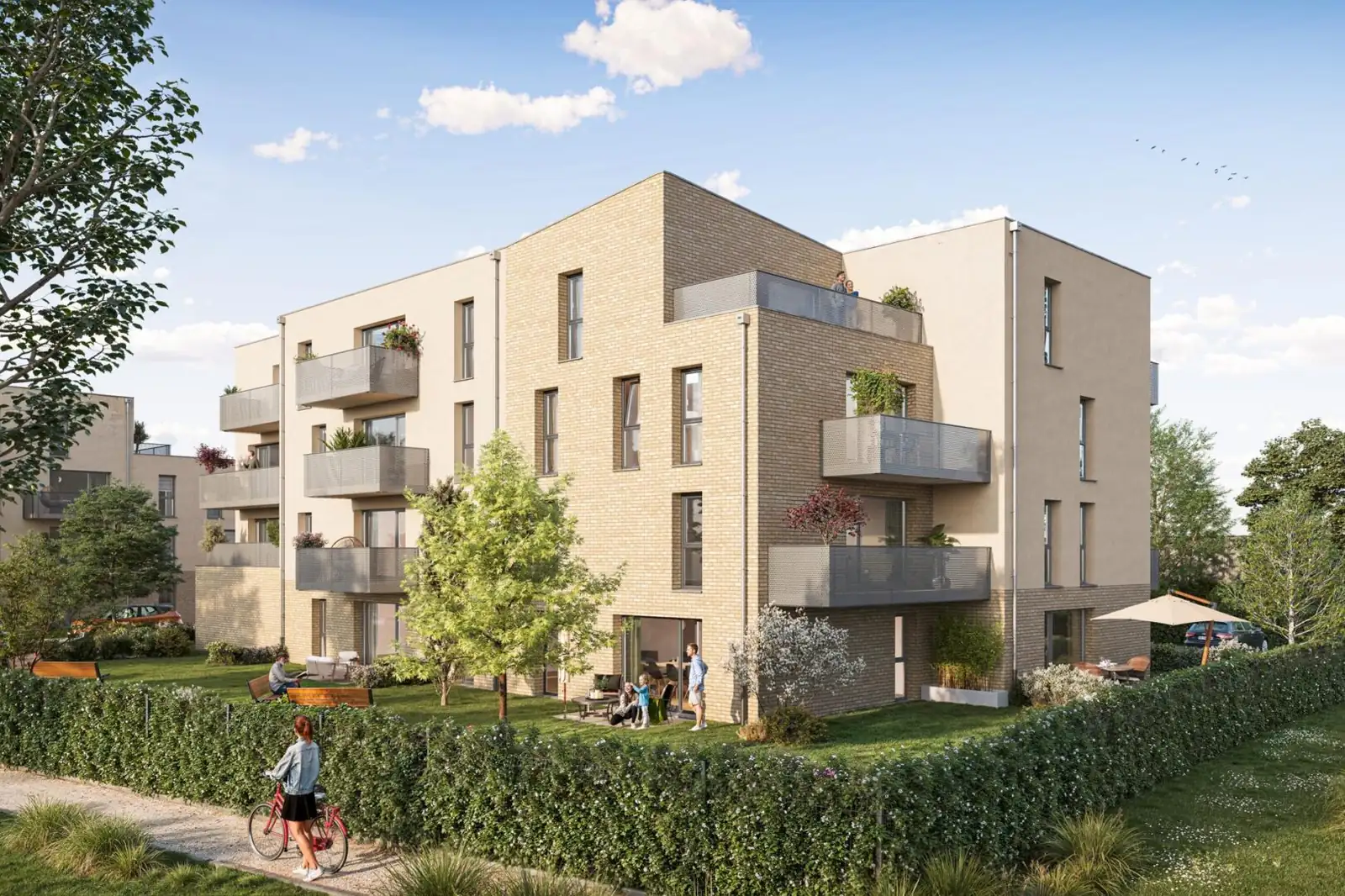 Perspective de la résidence L'Orée des Blés : façades en brique sable et enduit clair, balcons, jardins plantés.